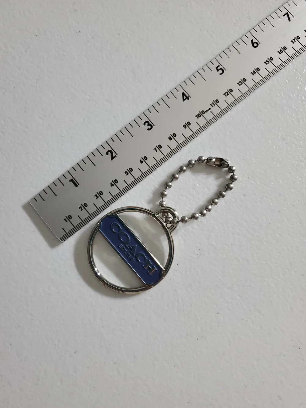 Coach Round Keychain with Blue Accent